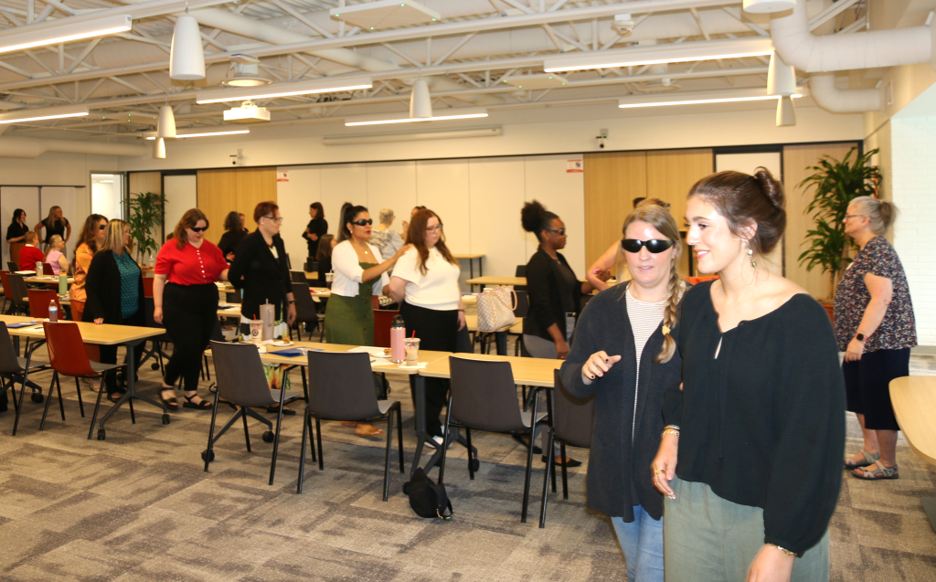 participants leading each other around the room